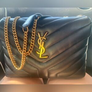 SAINT LAURENT
Loulou small quilted leather shoulder bag